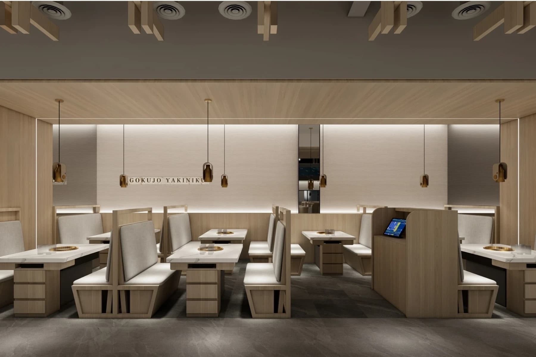 老井極上燒肉崇德店二樓餐飲空間，大氣沈穩的卡座座位排佈，簡練木質結構與現代燈光演繹 Quiet Luxury 隱奢感。
